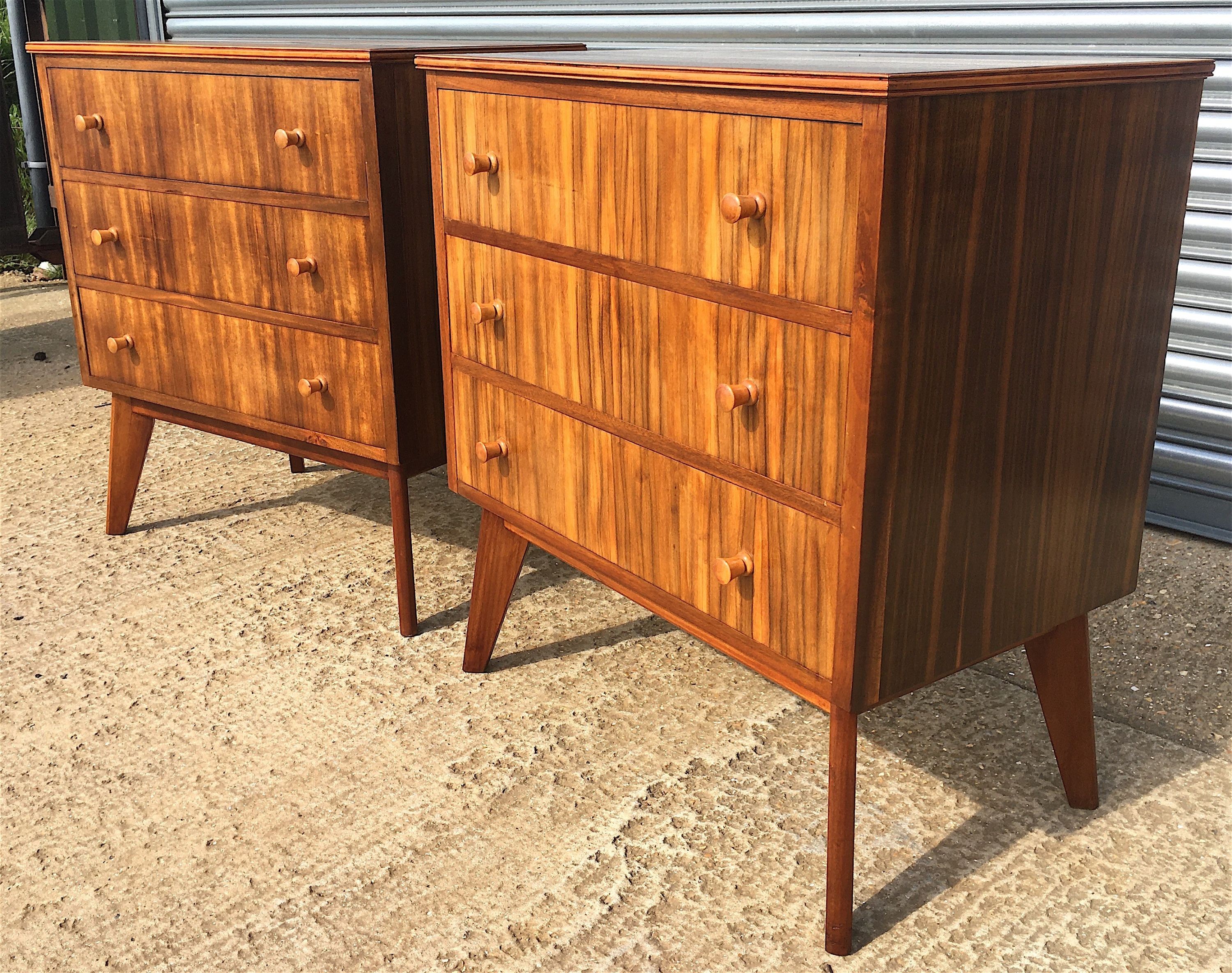 A pair of 1960s Morris Of Glasgow walnut three drawer chests, width 79cm, depth 47cm, height 86cm